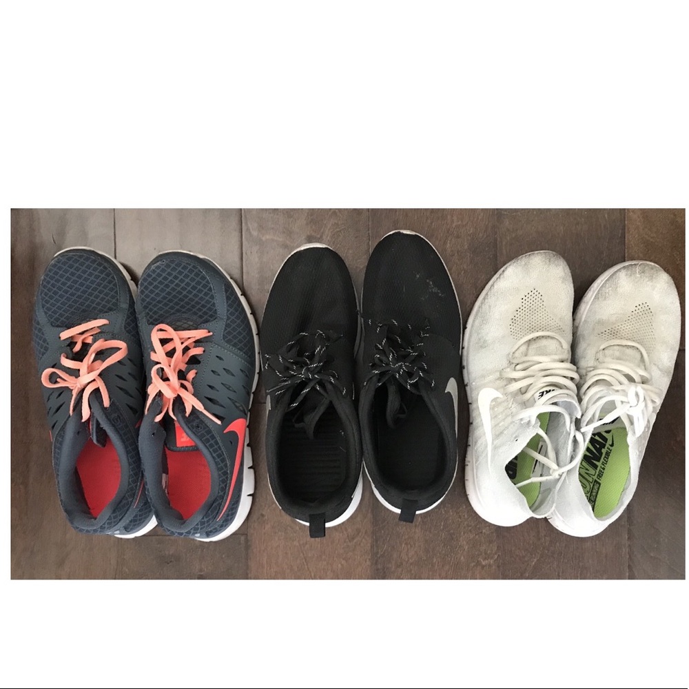 bundle of nike shoes. 3 pairs of nike sneakers